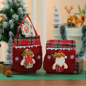 Christmas gift bag set featuring Santa and snowman designs with festive plush embroidery