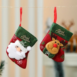 Festive Christmas stockings with 3D Santa and Reindeer figures for tree decoration