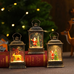 Retro Christmas water lanterns with Santa and Reindeer motifs, warm LED snowy lighting