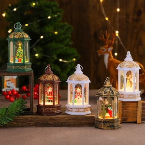 LED Christmas lantern set with snow globe effect and festive scenes on a wooden display