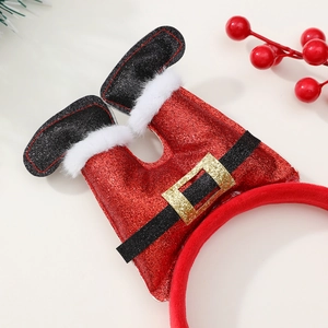 Détail d'un serre-tête jambes de Père Noël avec paillettes rouges et bordure en fourrure