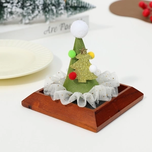 Green mini Christmas party hat accessory with glitter tree and lace trim detail