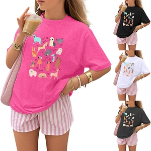 Detail of cartoon dog print on summer crewneck t-shirt and striped drawstring shorts
