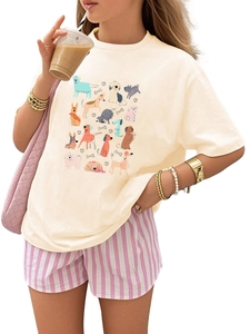 Detail of kids casual T-shirt with cartoon dog prints and striped wide-leg shorts
