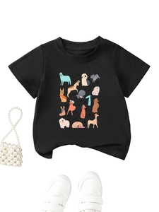 Close-up of black cotton kids' T-shirt featuring colorful cartoon dog prints and round neck