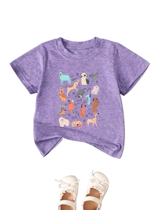 Flat lay of purple kids' dog bone t-shirt with cartoon patterns and lace shoes