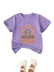 Detailed view of heather purple honey bee t-shirt and white lace bow baby shoes