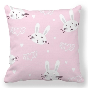 Detail of soft peach skin pillowcase with pink Easter rabbit and heart print