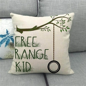 Close-up of linen cushion cover texture with tree branch and tire swing print