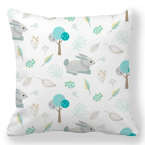 Detailed pattern showing gray bunnies and colorful trees on white square pillow cover