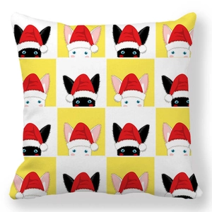Close-up of a festive Christmas cat pattern on soft yellow checkered throw pillowcase