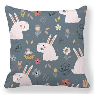 Nordic Easter bunny and floral illustration throw pillow with peach skin texture fabric