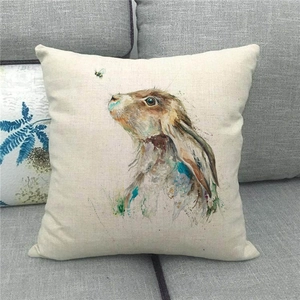 Detailed texture of linen throw pillow cover with watercolor Easter bunny and bee print