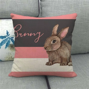 Detalle de textura de lino en funda de cojín de Pascua con diseño de conejo y rayas