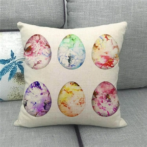 Close-up of Easter linen pillowcase showing detailed watercolor egg patterns and woven texture