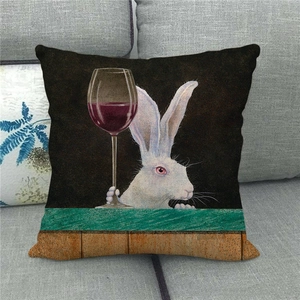 Detailed texture of linen cushion cover featuring a peeking rabbit with wine glass