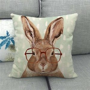 Detail of linen pillowcase with cute bunny wearing glasses for Easter home decoration
