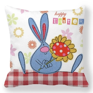 Detail of Happy Easter pillowcase featuring a blue rabbit and textured fabric print