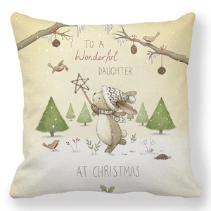 Close-up of Christmas rabbit pattern and text on peach skin fabric pillowcase