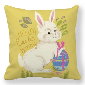 Close-up of yellow Easter pillowcase with white bunny and HELLO Easter Bunny text