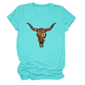 Close-up of turquoise cotton T-shirt featuring a detailed floral bull skull graphic print