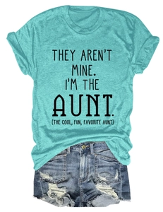 Flat lay of aqua crew neck T-shirt with black graphic text and denim shorts