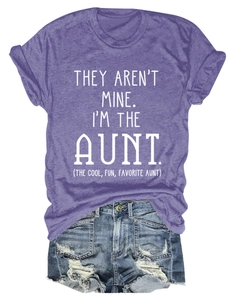 Detail of purple cotton blend slogan T-shirt paired with distressed denim shorts