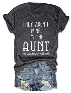 Detail of grey crewneck Aunt slogan tee paired with distressed blue denim shorts