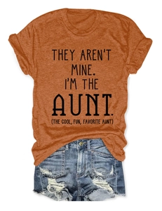 Close-up of burnt orange short sleeve T-shirt with black graphic text on white background
