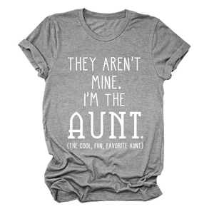 Detail of grey crewneck T-shirt showing folded sleeves and printed white text slogan