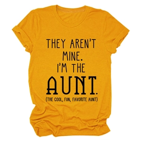 Close-up of ginger yellow t-shirt with black bold text for the cool fun favorite aunt