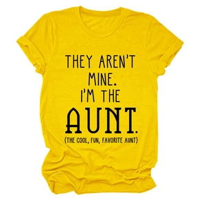 Detail of yellow cotton t-shirt fabric texture and black printed graphic slogan