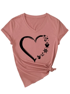Detail of pink V-neck T-shirt showing black heart print with resort graphics and hem knot