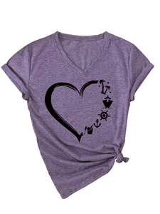 Detail of V-neck fuchsia t-shirt featuring rolled sleeves and heart cruise print