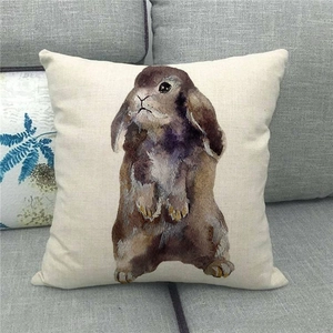 Detailed texture of linen Easter pillowcase featuring a watercolor brown rabbit design