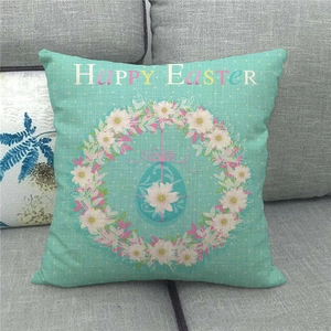 Detailed texture of Happy Easter linen pillowcase with mint green eggs on grey sofa