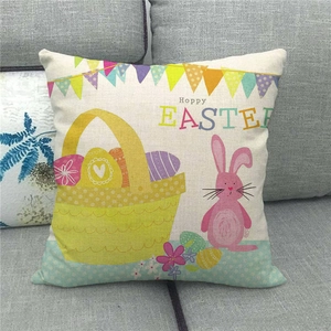 Linen Easter cushion cover with Hoppy Easter bunny and colorful eggs on a sofa