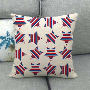 Detailed texture of linen star pillow cover with red and blue stripes on gray sofa