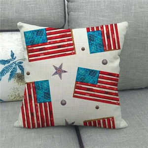 Detailed view of linen texture and American flag print on a vintage patriotic pillow cover