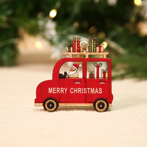 Detail of red wooden Santa car ornament with Merry Christmas text and gift boxes