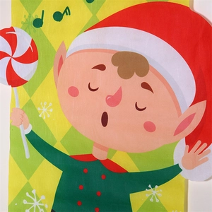 Détail d'une bannière de Noël avec elfe de dessin animé mignon, bonnet rouge et sucre d'orge