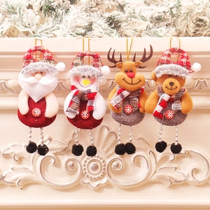 Detail view of 4-piece plush Christmas ornaments including Santa, snowman, elk, and bear