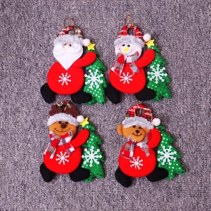 Set of 4 plush Christmas ornaments including Santa, snowman, elk, and bear with gold cords