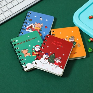 Set of four Christmas mini spiral notebooks featuring Santa and Reindeer cartoon covers
