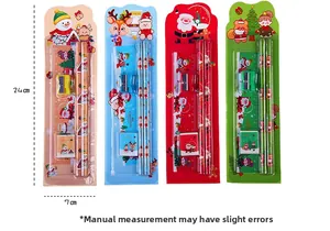 Detailed view of five-piece Christmas stationery set with ruler, pencil, and eraser