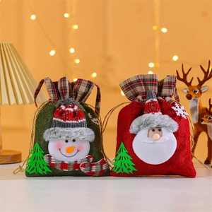Detail of Christmas non-woven gift bags with 3D Santa and snowman plaid designs