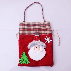 Detailed view of red Christmas gift bag with 3D Santa Claus and plaid handle textures