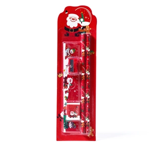 5-piece Christmas stationery set featuring Santa pencils, ruler, eraser, and sharpener