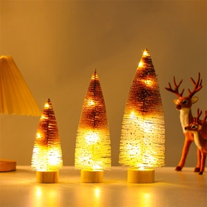 Three-piece glowing sisal mini Christmas trees with warm LED lights and solid wood bases
