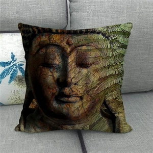 Detailed texture of linen pillowcase featuring Buddha art and green fern leaves decor